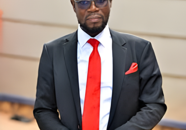 Kawempe North MP Nalukoola Picks Up Litter from Road, Earns Praise for Civic Act